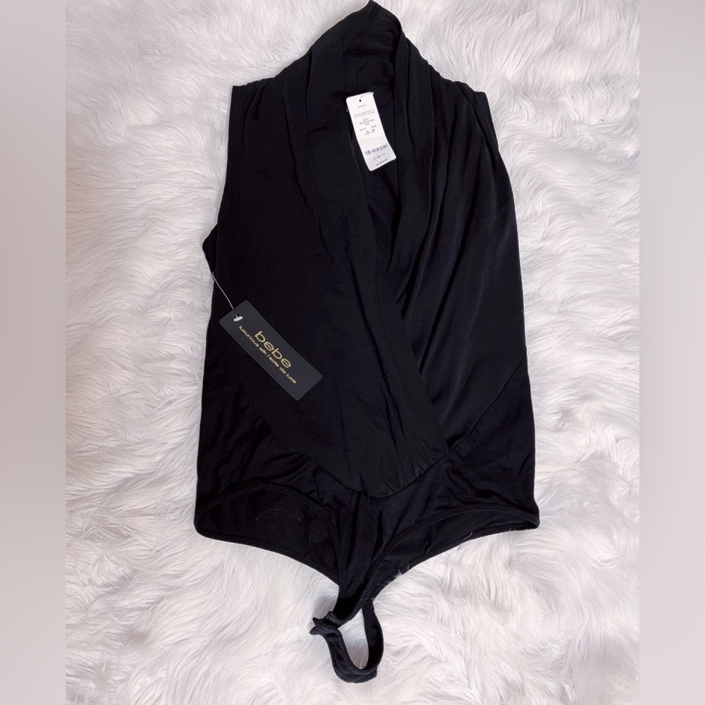 Bebe ruched neckline bodysuit. Brand new with tags. Small